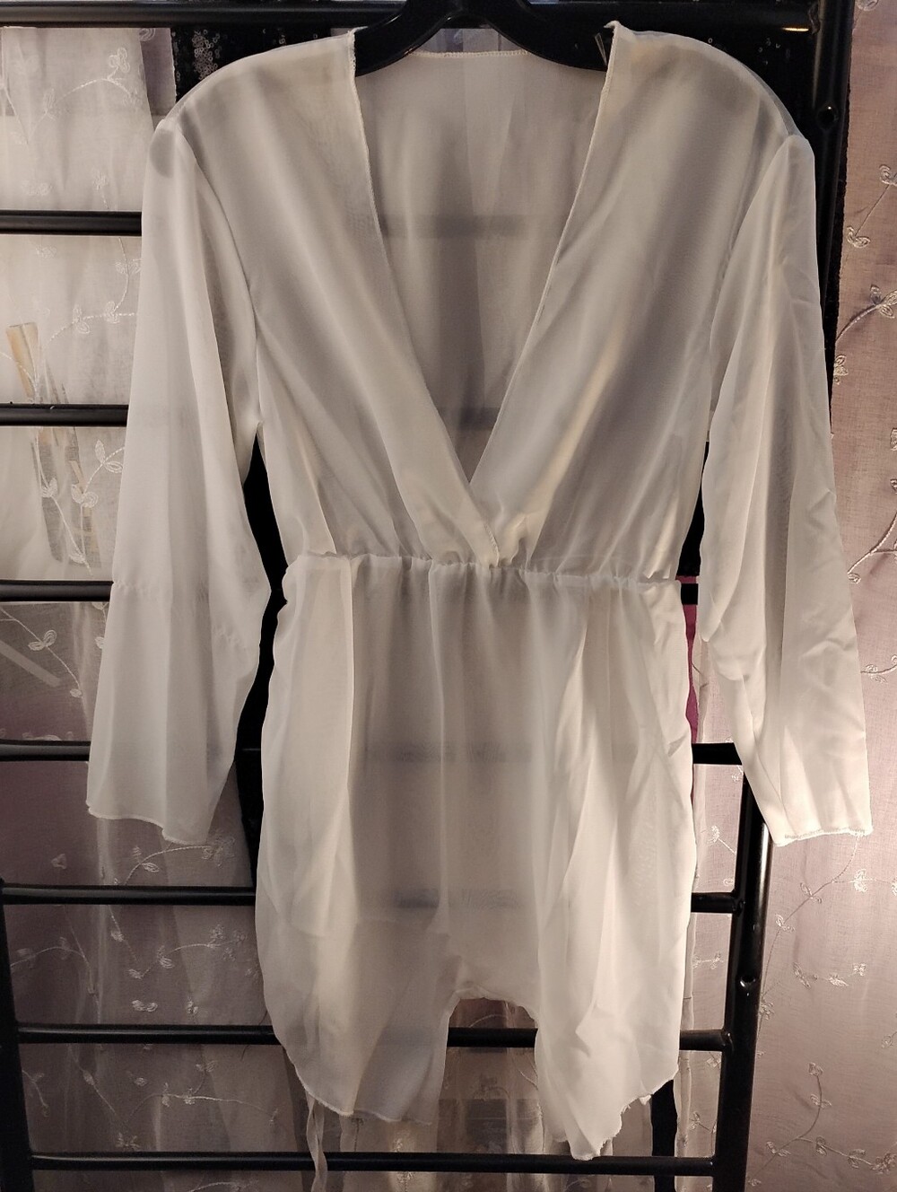 Sheer white long-sleeve cover-up. Side Draw Strings Length Adjustable. Size Smal